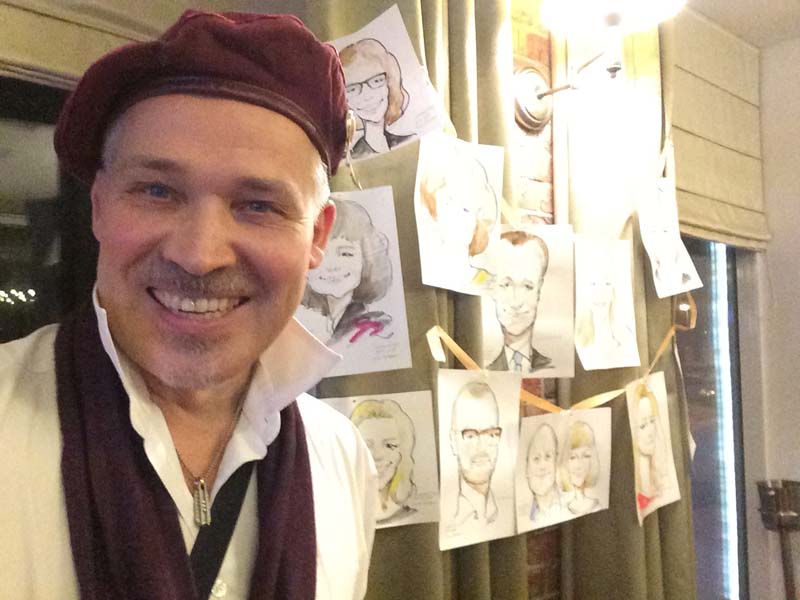 Шаржист на Юбилее в 